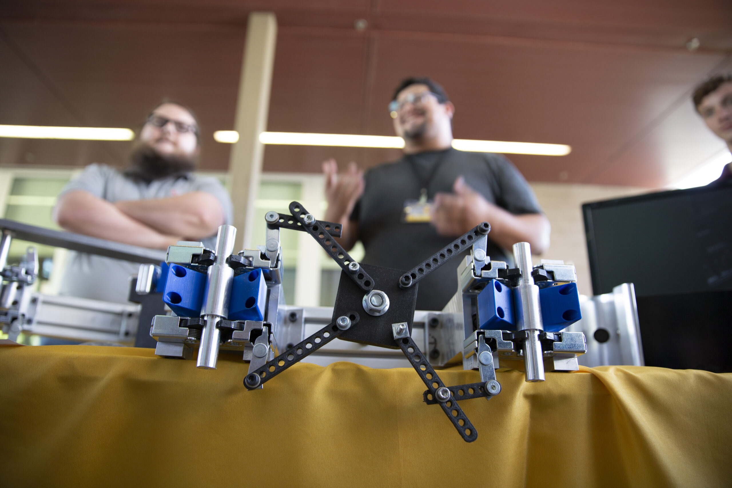 An eProjects team with a portion of their mechanical docking invention solution